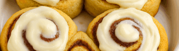 Homemade keto cinnamon rolls with icing, a low-carb Cinnabon-inspired recipe for a guilt-free treat.